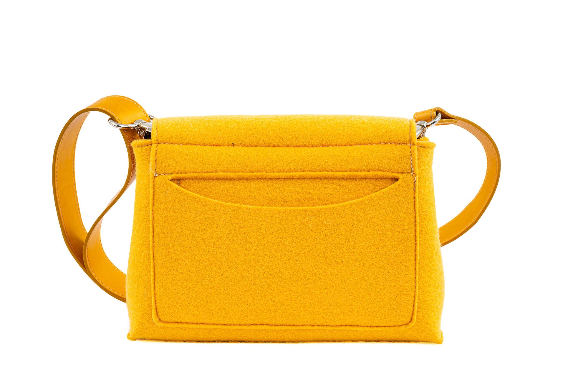 JOY Yellow Crossbody Bag: Small, stylish, and ergonomic with vibrant color options. Features 3 pockets (2 external, 1 internal) for essentials, flap with magnetic closure, and adjustable strap for comfort. Made from 3mm Merino wool felt and bio-based vegan leather. Handmade in Italy.