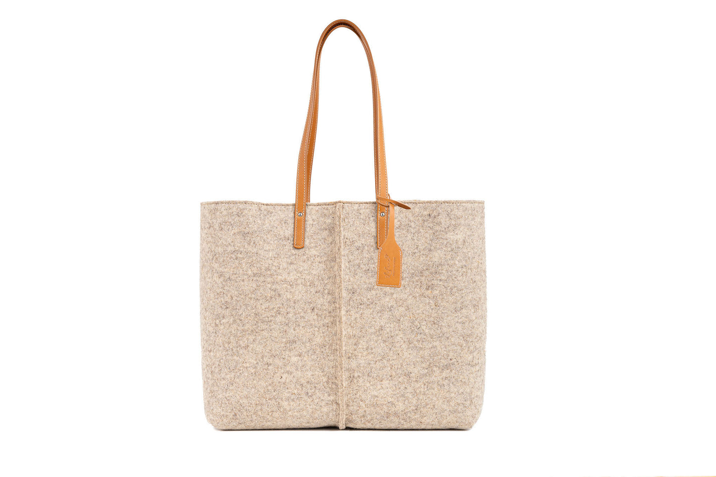 Tote Bag Large Beige made of Merino wool felt and vegan leather, featuring two large internal pockets, perfect for work or a day out. Soft, sturdy, and roomy without being bulky, with a large opening and internal magnetic buttons for easy access and security. Handmade in Italy.