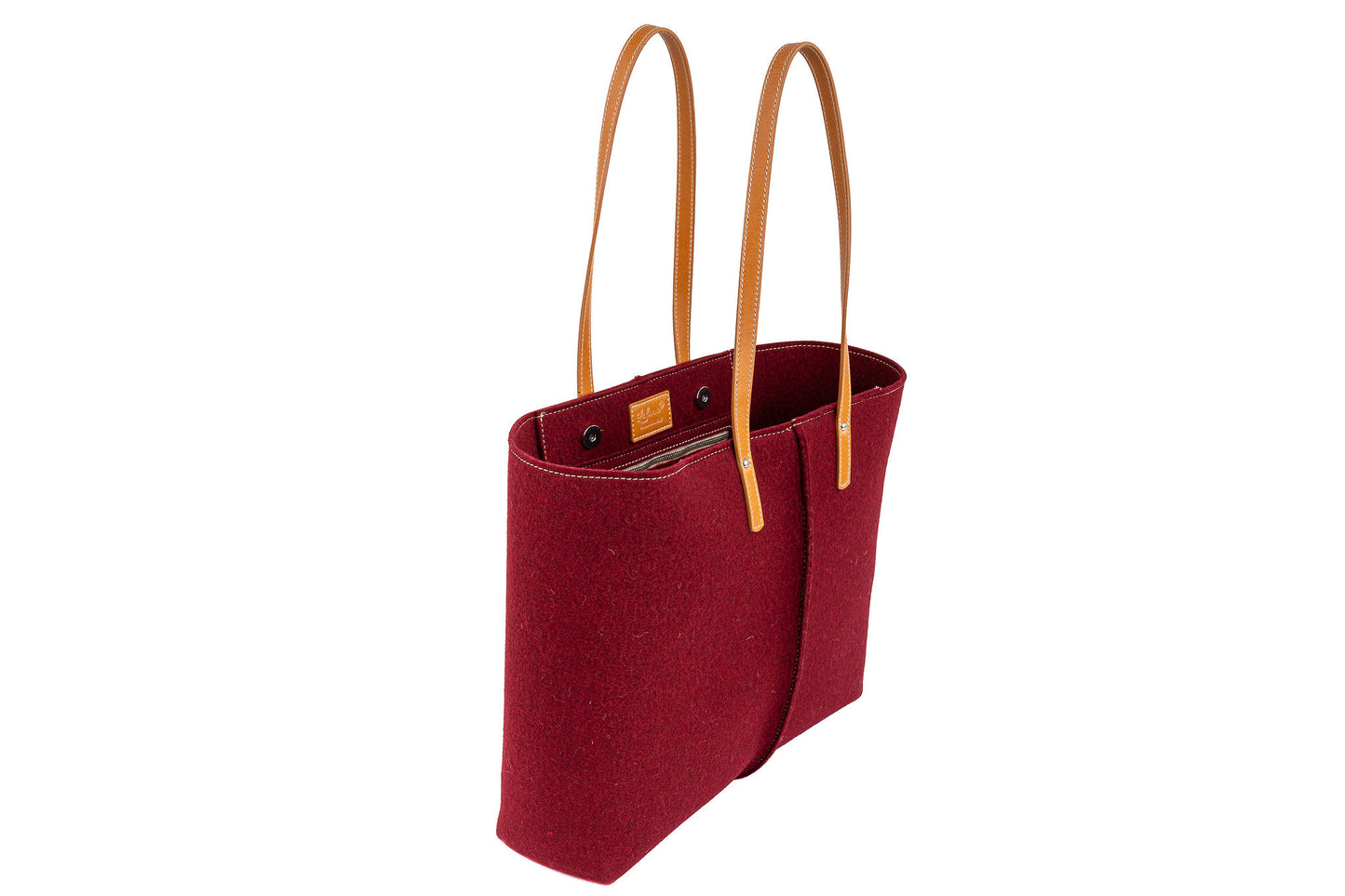 Tote Bag Large Bourdeaux made of high-quality Merino wool felt and vegan leather, featuring two large internal pockets. Soft, sturdy, and roomy, perfect for work or a day out. Easy access with internal magnetic buttons and a large opening. Handmade in Italy, comes with a natural cotton dust bag. - Lefrac