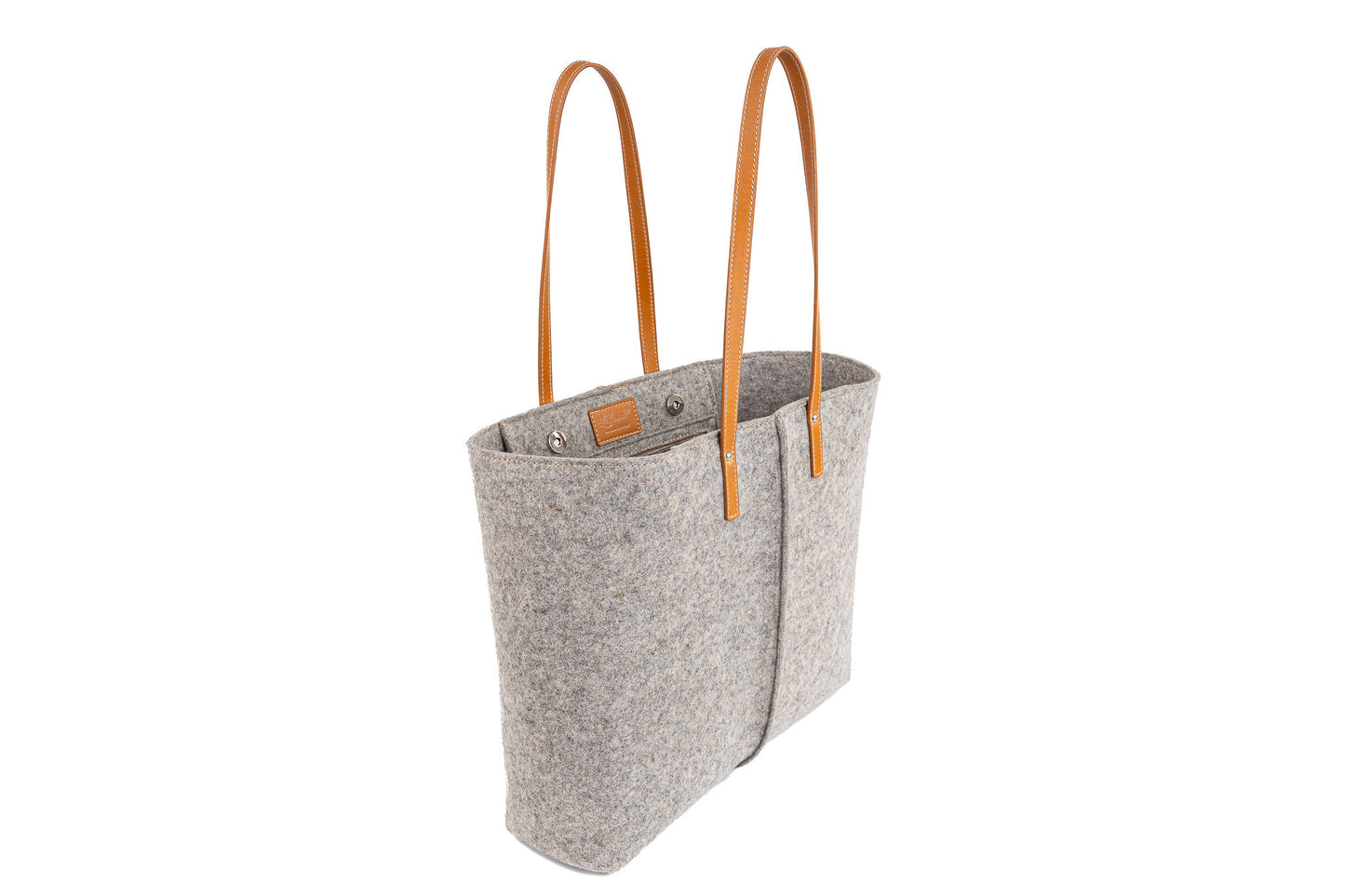 Tote Bag Large Grey made of 3mm Merino wool felt with vegan leather accents. Features include two internal pockets (one zippered, one open), a 27 cm handle drop, and a pendant with the Lefrac logo. Fits laptops up to 13”, tablets, and e-readers. Comes with a natural cotton dust bag. Handmade in Italy. - Lefrac