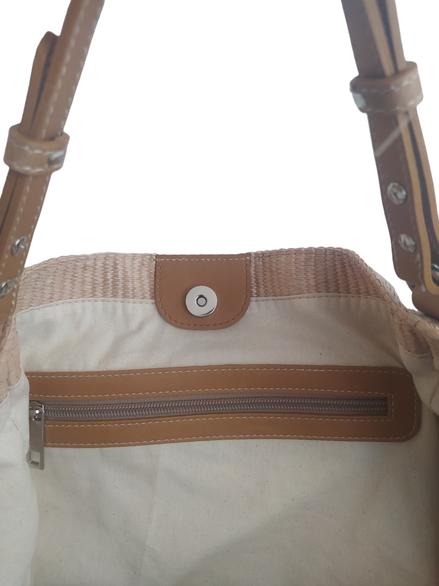 Beige Margot bag: large, soft, and lightweight, crafted from cotton with a raffia-like texture. Features vintage-style vegan leather handles, 3 large pockets (one zippered), internal magnetic button, and a leather lace with carabiner for adjustable shape. Measures 36cm H x 36-56cm W x 25cm D. Comes with a dust bag and tracking. Vegan leather is 69% organic materials.- Lefrac